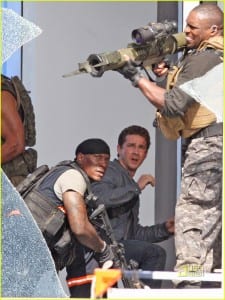 June 17th 2010 Los Angeles, California. ***WORLD EXCLUSIVE*** The very first photos of Shia LaBeouf and Rosie Huntington Whiteley filming Transformers 3. Director Michael Bay and actor Tyreese also photographed. This thrilling action scene involves Shia and Rosie being chased by an evil Decepticon Transformer and the US military trying to fend off the evil robot. As Shia and Rosie run for safety through an office building, the Decepticon tips the building over. For this scene one floor of an office building was built on a giant platform that tilts to an angle. All cast and crew appeared to be very happy working together and very focused on creating the "greatest action film of all time". Later in the day, while filming continued, a big satellite TV was brought on the set to air the live championship game between the Los Angeles Lakers and the Boston Celtics. Everyone stopped working to watch the final few minutes of the exciting game. When the Lakers won, there were wild cheers and applause by most people on set including big Laker fan, Shia LaBeouf. Photo by Eric Ford/ On Location News. 818 613 3955 info@onlocationnews.com
