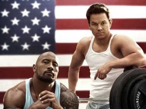 Dwayne Johnson e Mark Wahlber nel poster di Pain and Gain