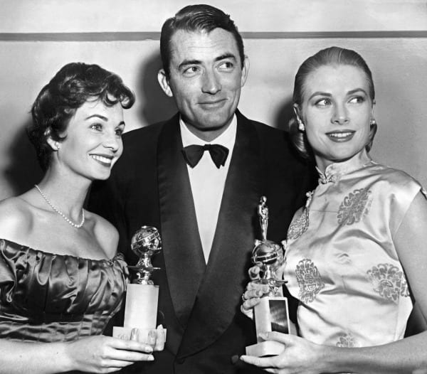 Jean Simmons, Gregory Peck e Grace Kelly | © AFP / Getty Images